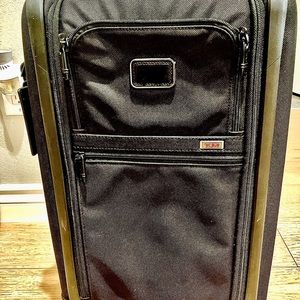 Tumi international four wheel luggage